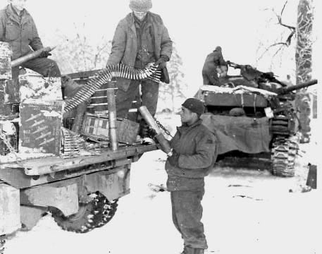 15. 42nd Tank men issue ammo to Tank Driver James C. Ramsey