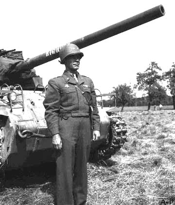 66. General Dager in front of tank.