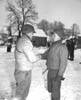 77. At 22nd Tank Bn. ceremony Gen. Kilburn shakes hands with