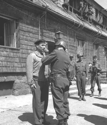 110. General Dager pins medal on Russian.