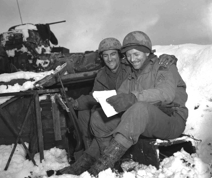 202. 2-11-45 491st AFA men read letters from home three mile