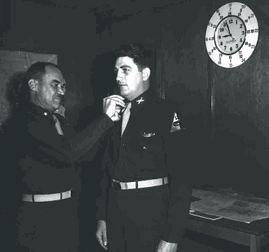 744. New Lieutenant receives bars from Gen. Kilburn.