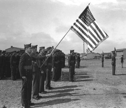 824. 56th Engineers present colors.